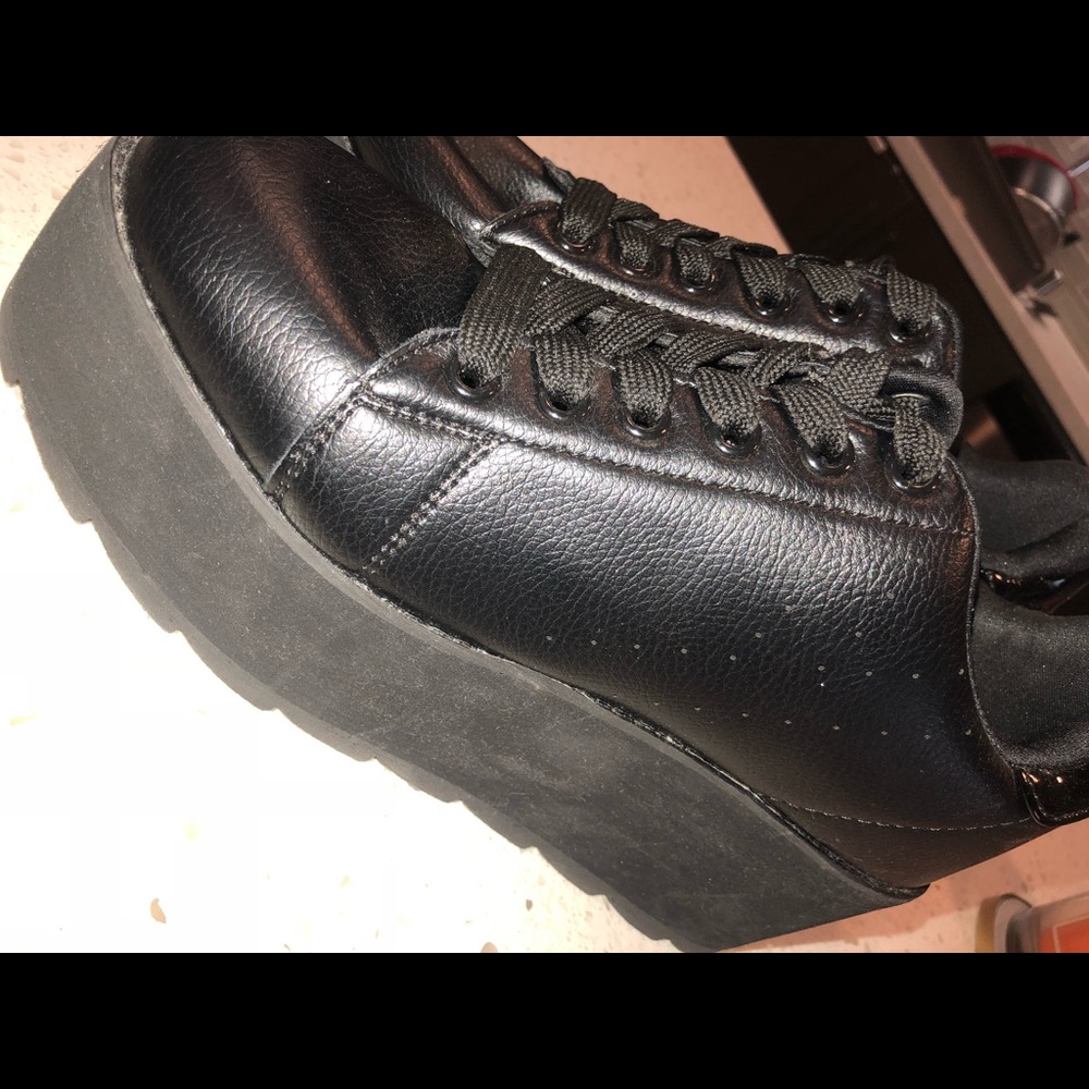 Black platform sneakers